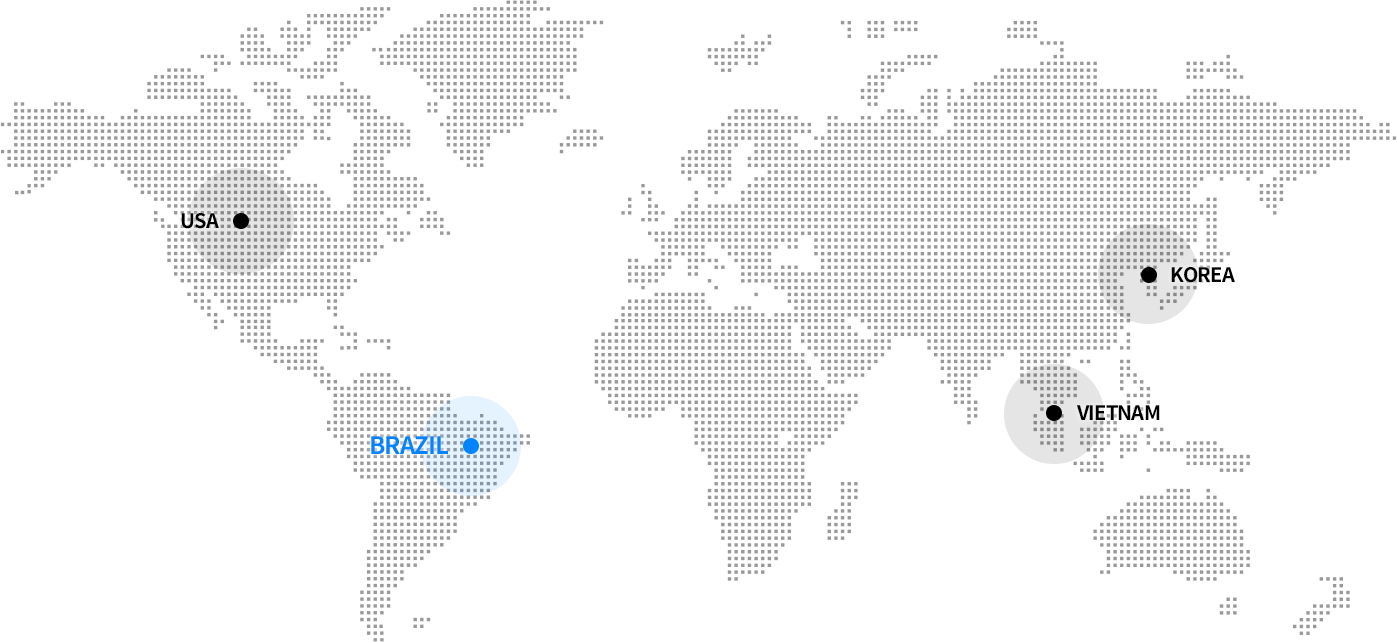 It is indicated by HANAMICRON's global world map, marked on USA, BRAZIL, VIETNAM, and KOREA, and selected on BRAZIL.